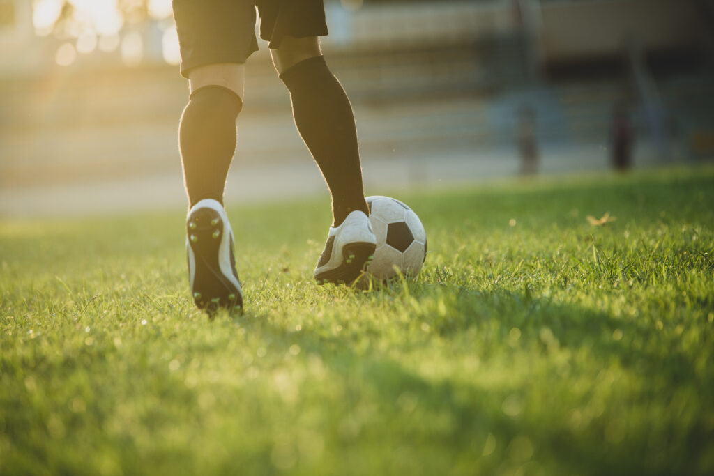 A football player prepares to score the winning goal